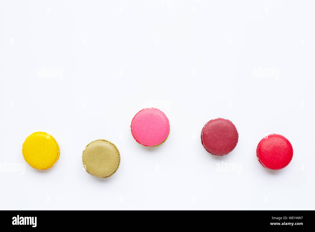 Colorful macarons isolated on white background. Stock Photo