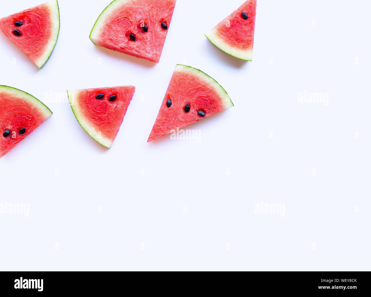 Watermelon sliced on white background. Top view Stock Photo - Alamy