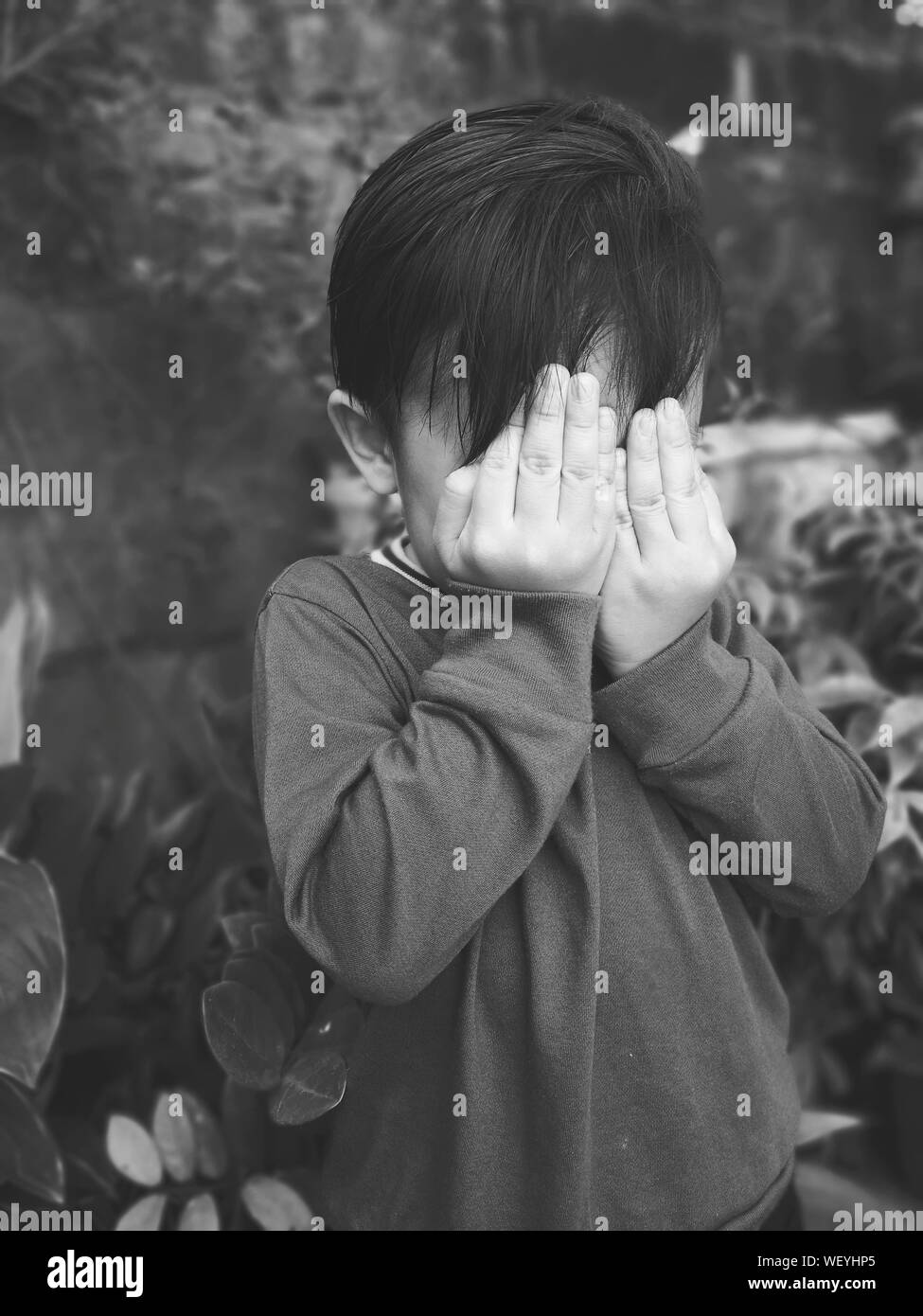 Child covering face hires stock photography and images Alamy