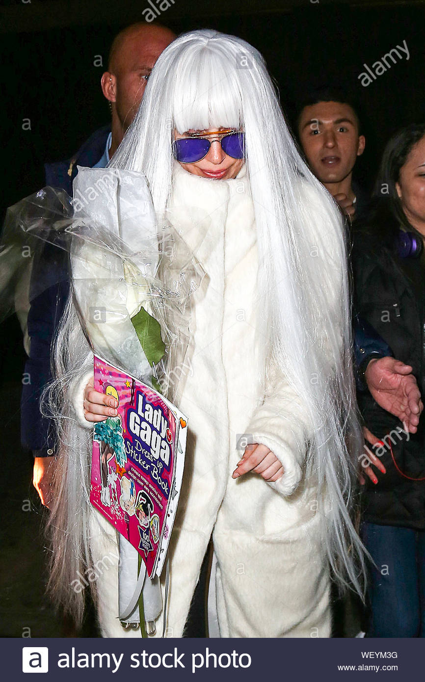 New York Ca Lady Gaga Is Dressed In All White As She Steps Out Of Her New York Apartment This Morning Holding Her Lady Gaga Dress Up Sticker Book For Her Newest