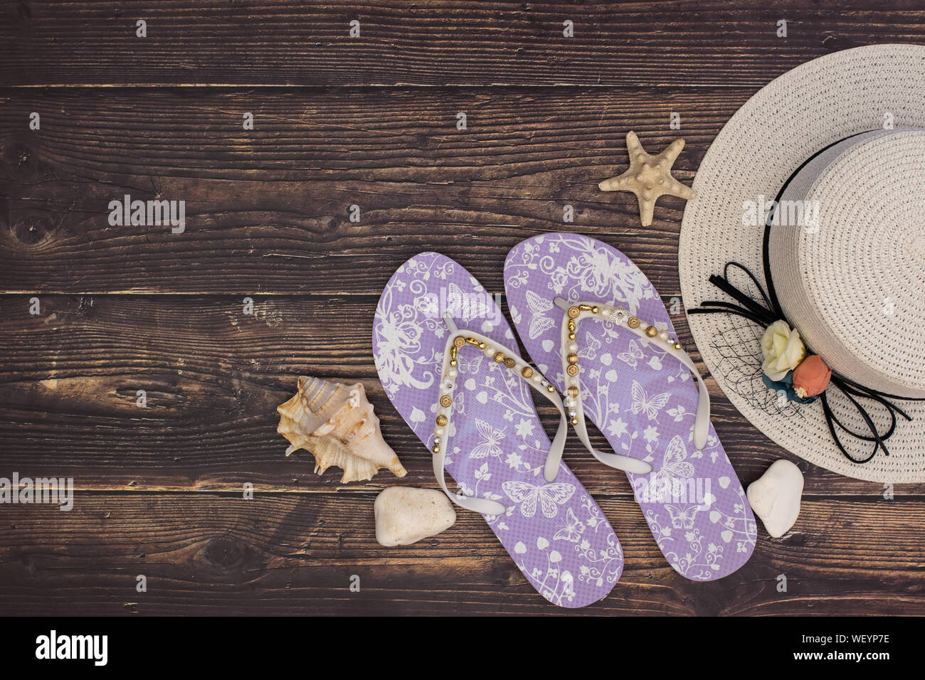 Summer kit and beach accessories on wooden background Stock Photo