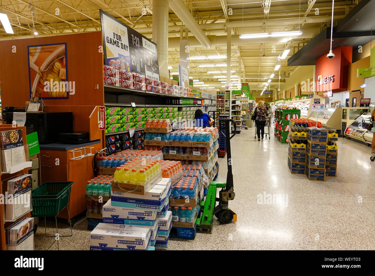 Orlando,FL/USA-8/30/19: Empty grocery store shelves of soda and power drinks before a hurricane or snow storm. Stock Photo