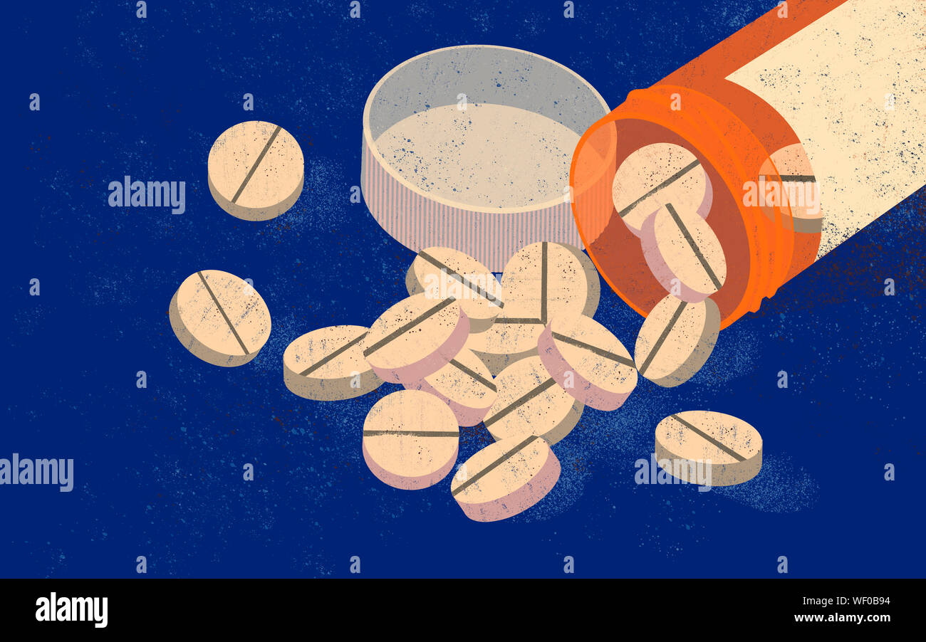 The opioid epidemic. American people deadly addiction. Orange opioid pill bottle. Stock Photo