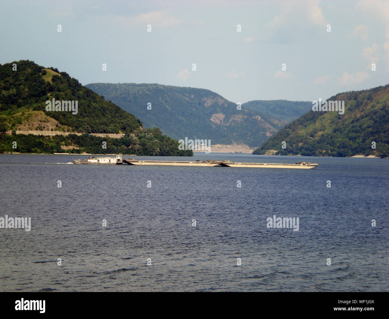 Barge on Danube River on Iron Gates I lake in Orsova, Romania Stock Photo