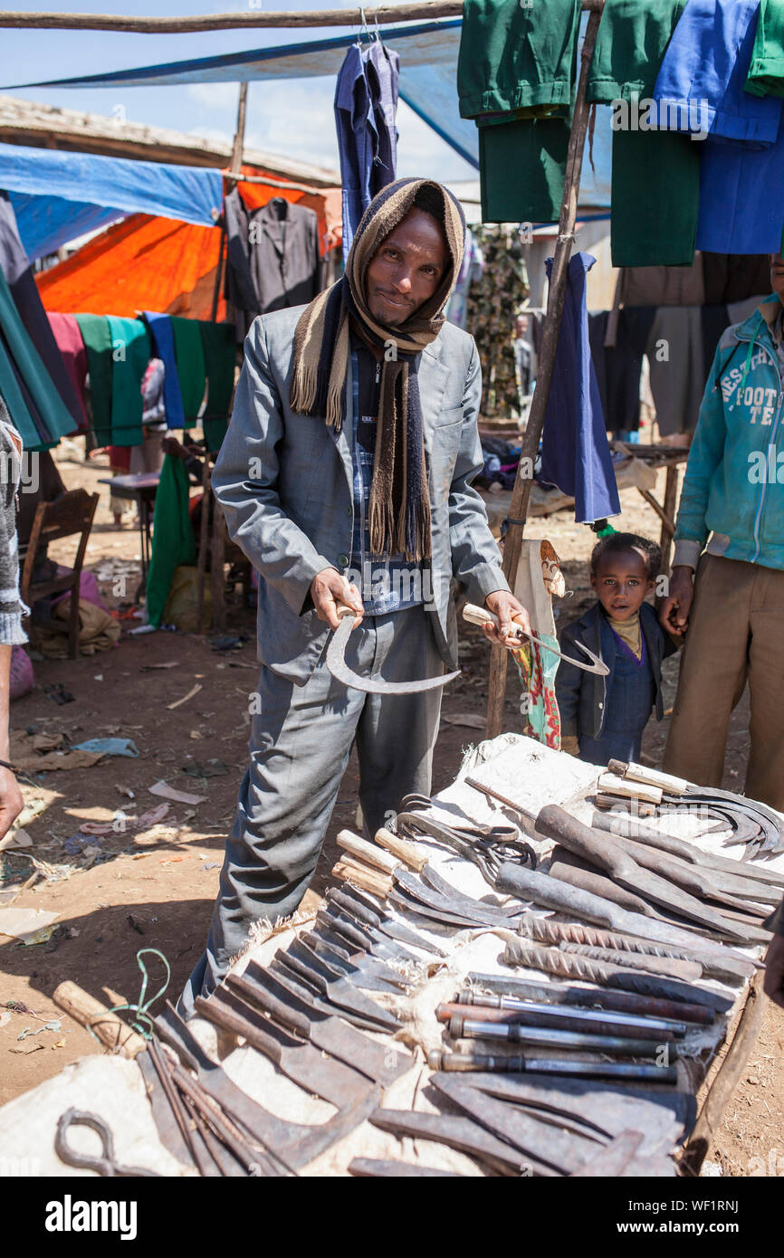 JELDU GOJO, ETHIOPIA-NOVEMBER 5, 2014: Unidentified blacksmith sells
