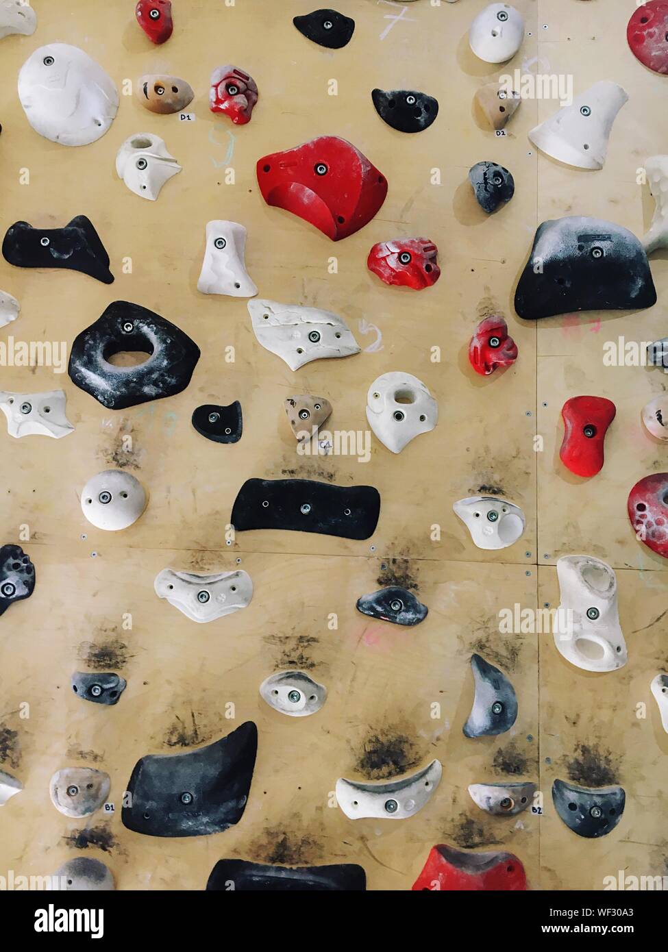 Colorful Grips On Climbing Wall Stock Photo Alamy