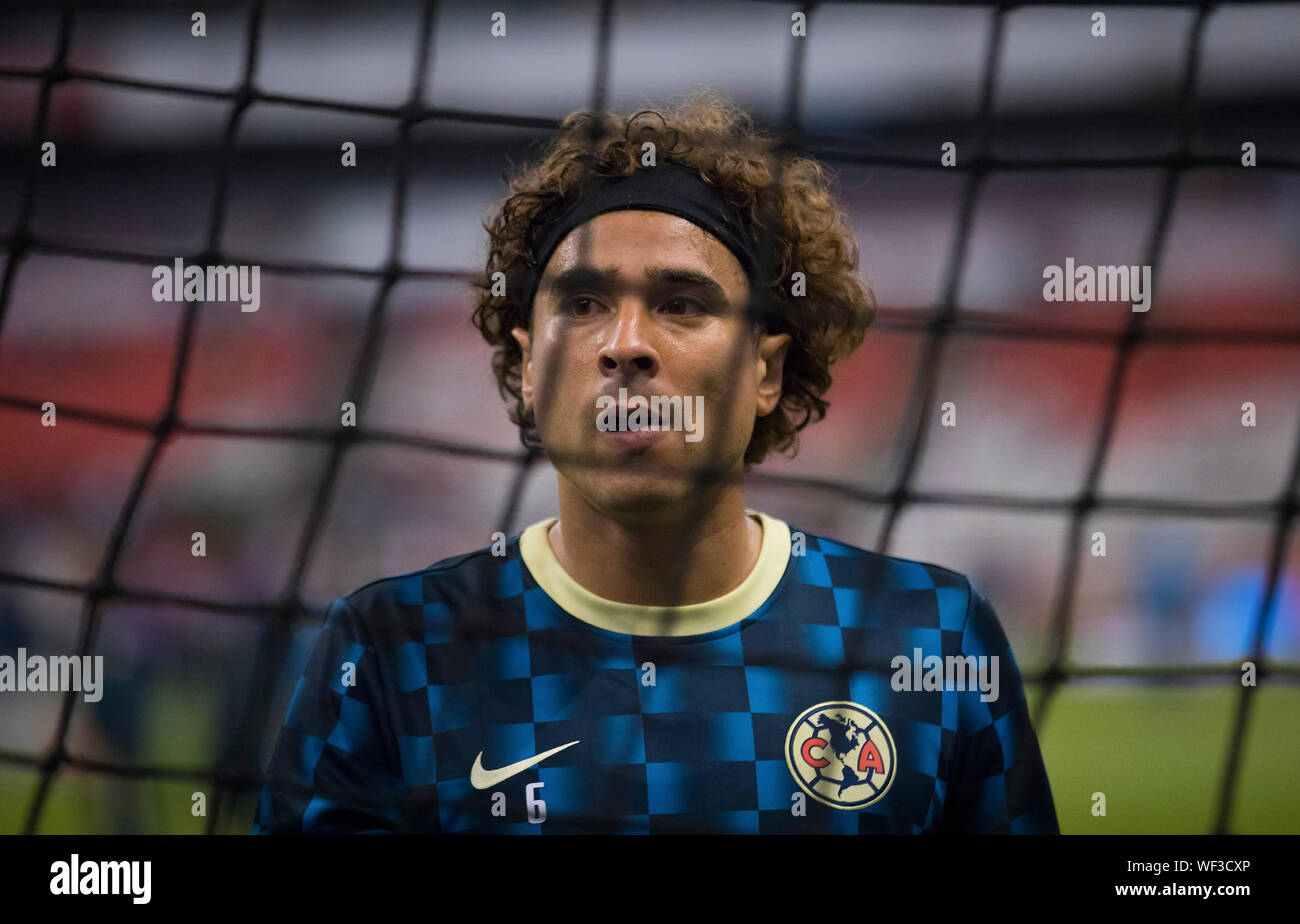 MEXICO CITY, MEXICO - AUGUST 27: Guillermo Ochoa of America gestures prior to the LigaMx match between America and Pachuca at Azteca Stadium on August Stock Photo