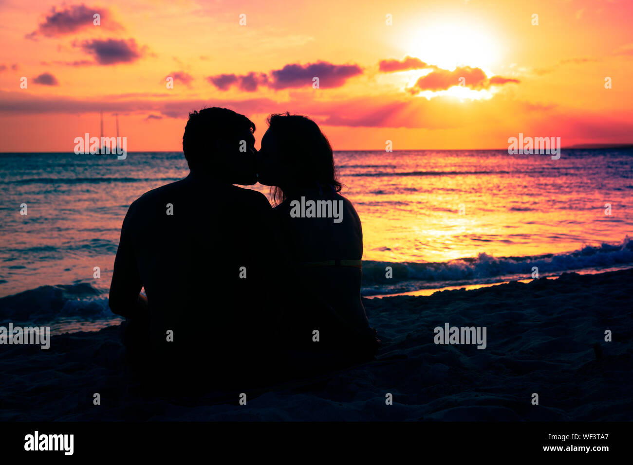 Kissing Couple Silhouette Sunset