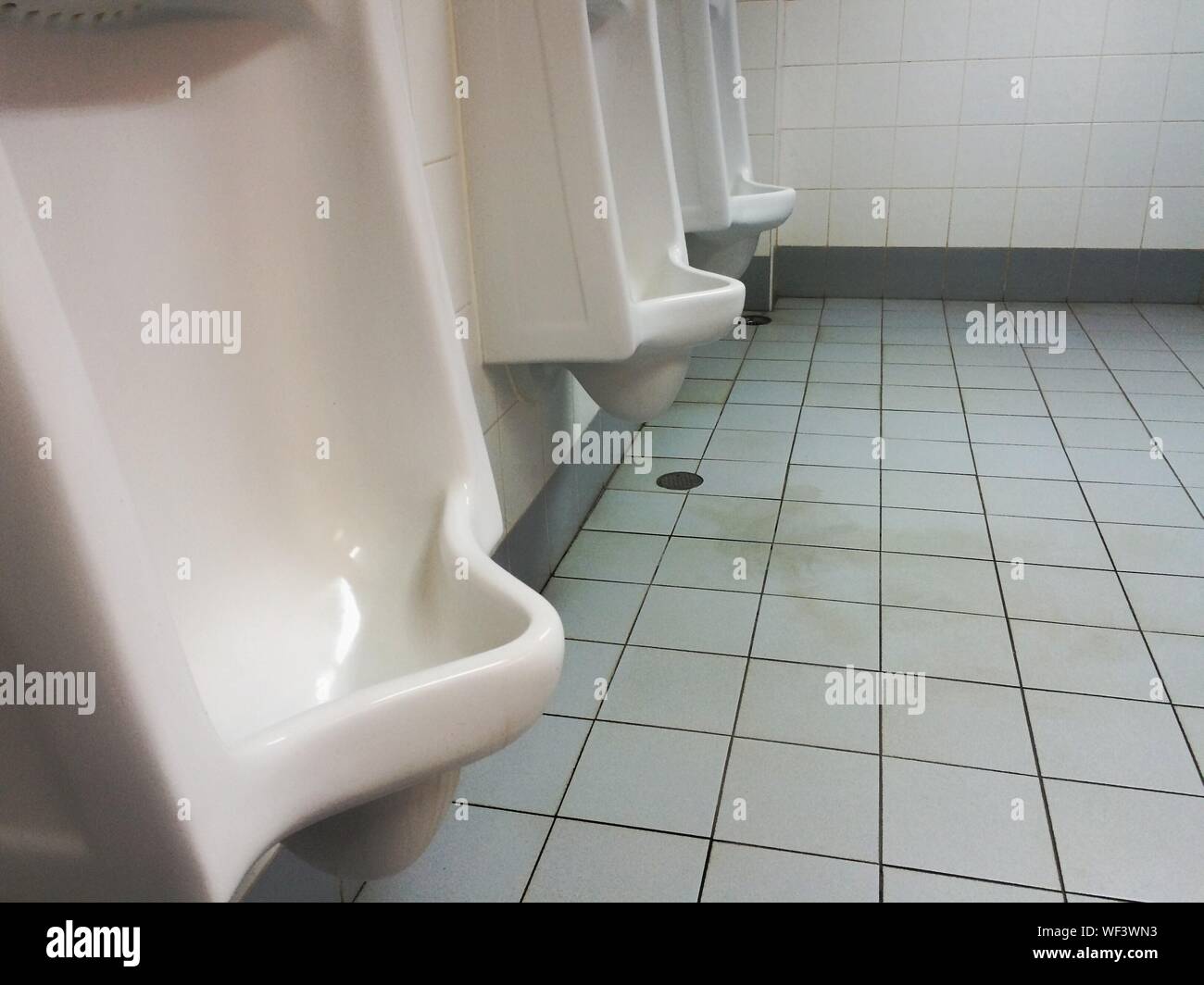 Urinals In Bathroom Stock Photo Alamy