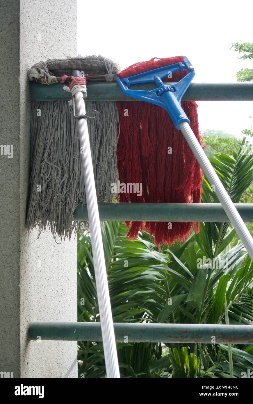 Closeup Of Mop By Railing In Balcony Stock Photo Alamy