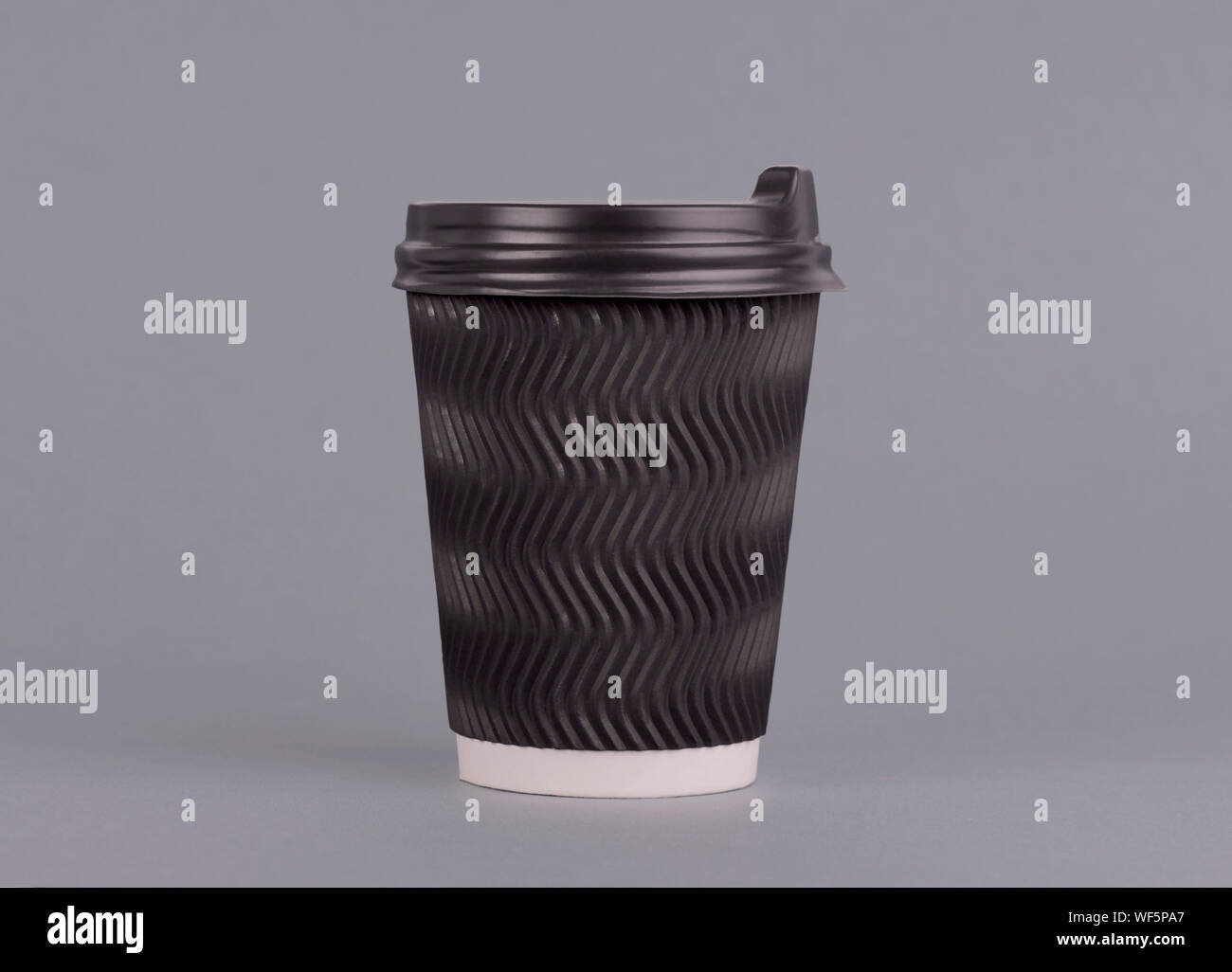 Black paper coffee cup. On grey background. Takeaway cup of coffee mock ...