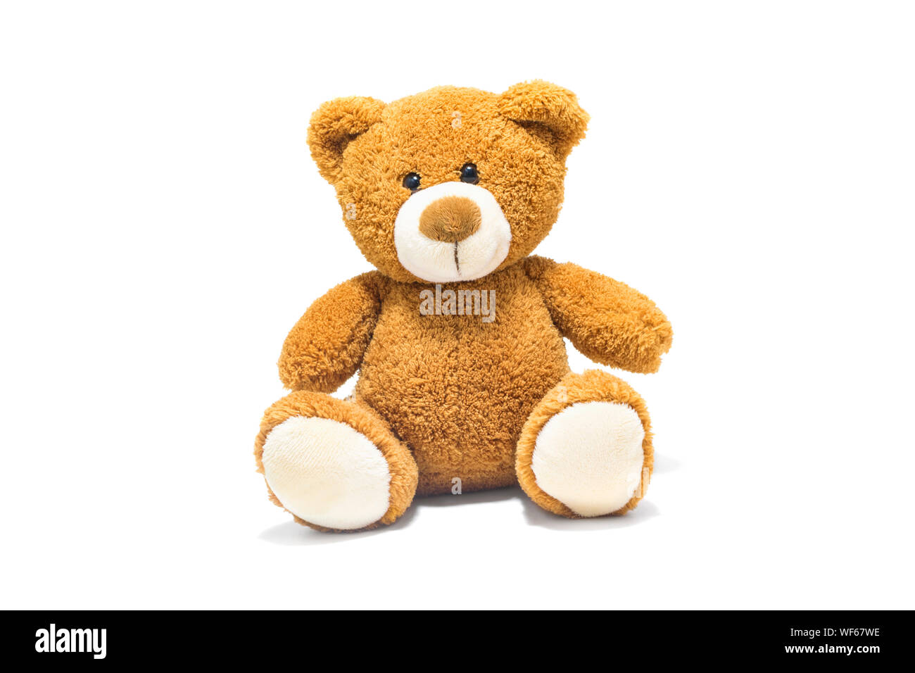 Brown Stuffed Toy Over White Background Stock Photo