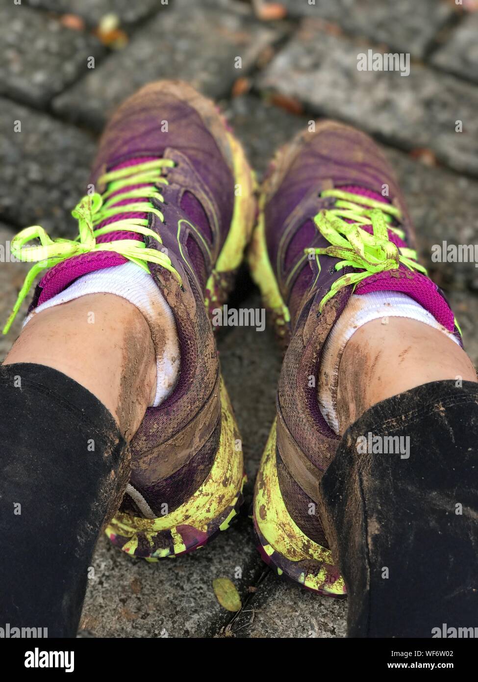 Woman with dirty shoes hi-res stock photography and images - Alamy