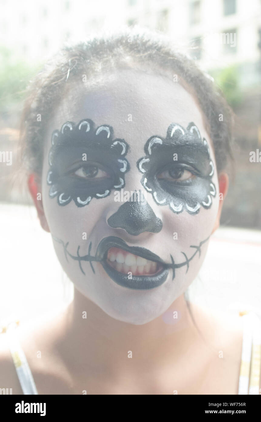 Portrait Of Teenage Girl With Day Of The Dead Face Paint Stock Photo