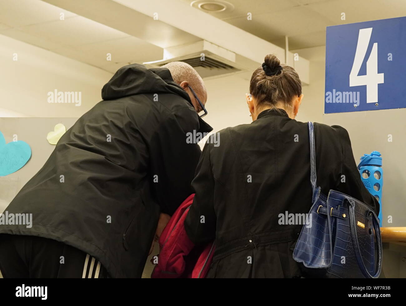 Wethersfield, CT / USA - June 11, 2019: A couple consults a customer service agent at the fourth booth Stock Photo