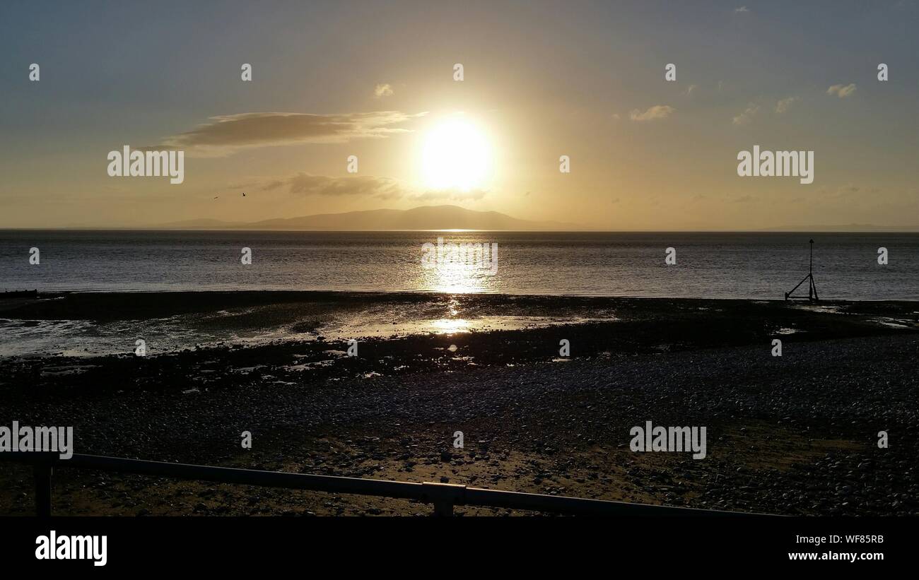 Idyllic Shot Of Solway Firth Against Sunset Sky Stock Photo