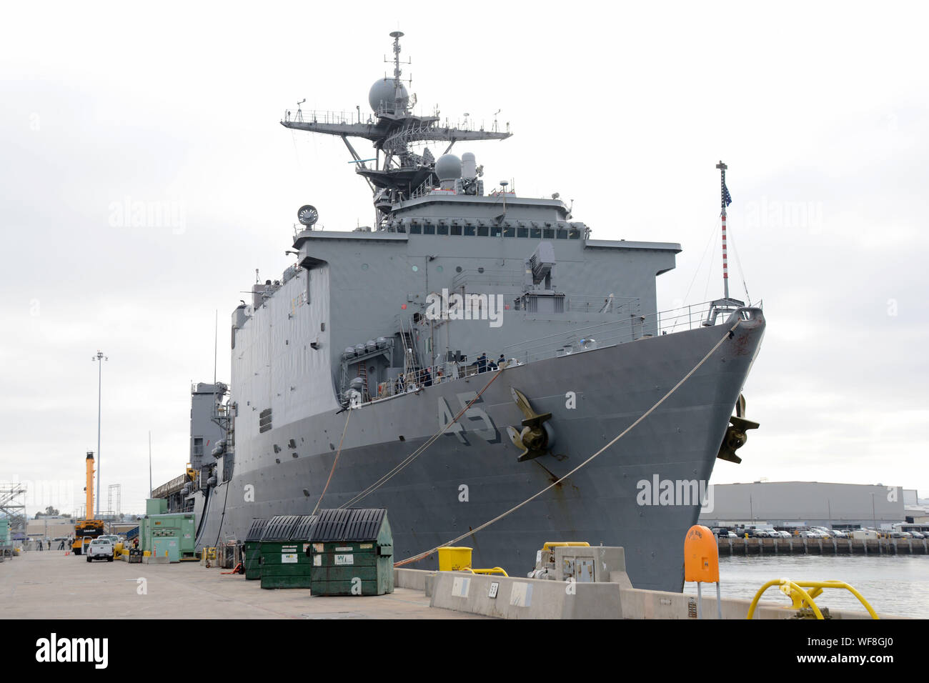 190819-N-XN177-0003 SAN DIEGO (Aug. 19, 2019) – The dock landing ship USS Comstock (LSD 45) sits pier-side at Naval Base San Diego as it prepares to go underway for routine operations. This year USS Comstock will participate in the U.S. Navy Fleet Weeks in both Los Angeles and San Francisco. (U.S. Navy Photo by Mass Communication Specialist 1st Class Peter Burghart/Released) Stock Photo