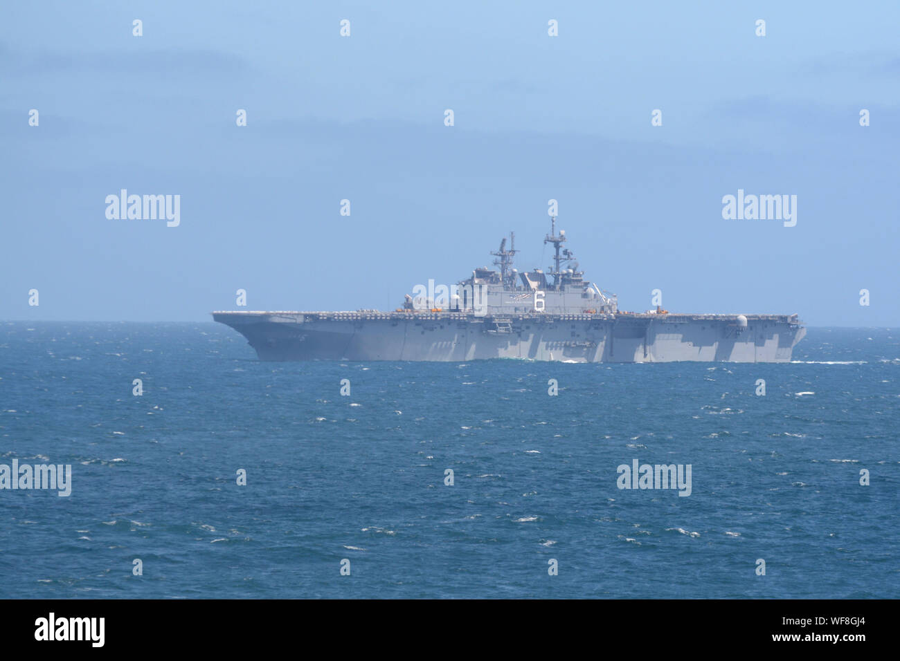 190820-N-XN177-0102 PACIFIC OCEAN (Aug. 20, 2019) – The amphibious assault ship USS America (LHA 6) prepares to come along side the dock landing ship USS Comstock (LSD 45) during a replenishment at sea evolution. Comstock is currently underway conducting routine operations. This year USS Comstock will participate in the U.S. Navy Fleet Week in Los Angeles. (U.S. Navy Photo by Mass Communication Specialist 1st Class Peter Burghart/Released) Stock Photo