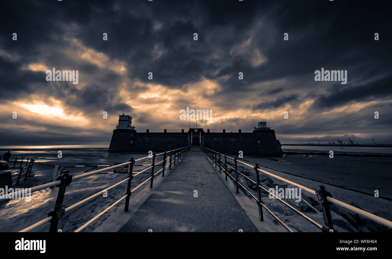 Fort Perch Rock, Wallasey, Wirral against a dramatic sky. Stock Photo