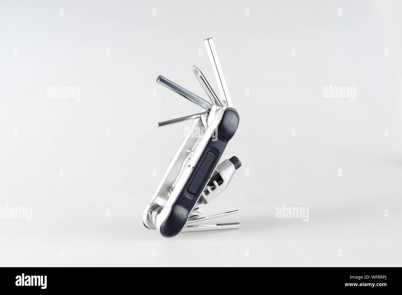 Bicycle multi-function tool with integrated chain tool and tyre levers Stock Photo