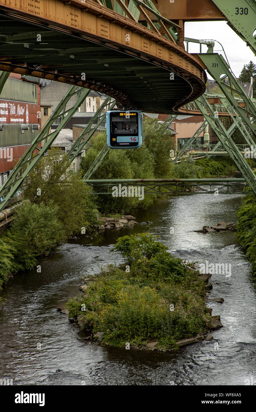 The Wuppertal suspension railway, train of the latest generation #15, running over river Wupper, Wuppertal, Germany, Stock Photo