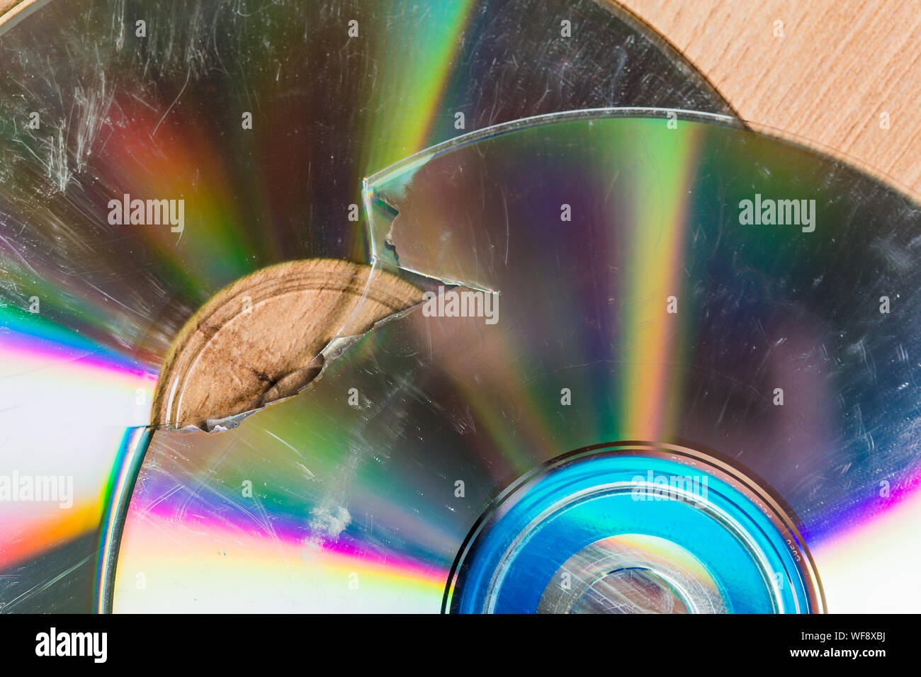 Broken and damaged optical disk storage data Stock Photo