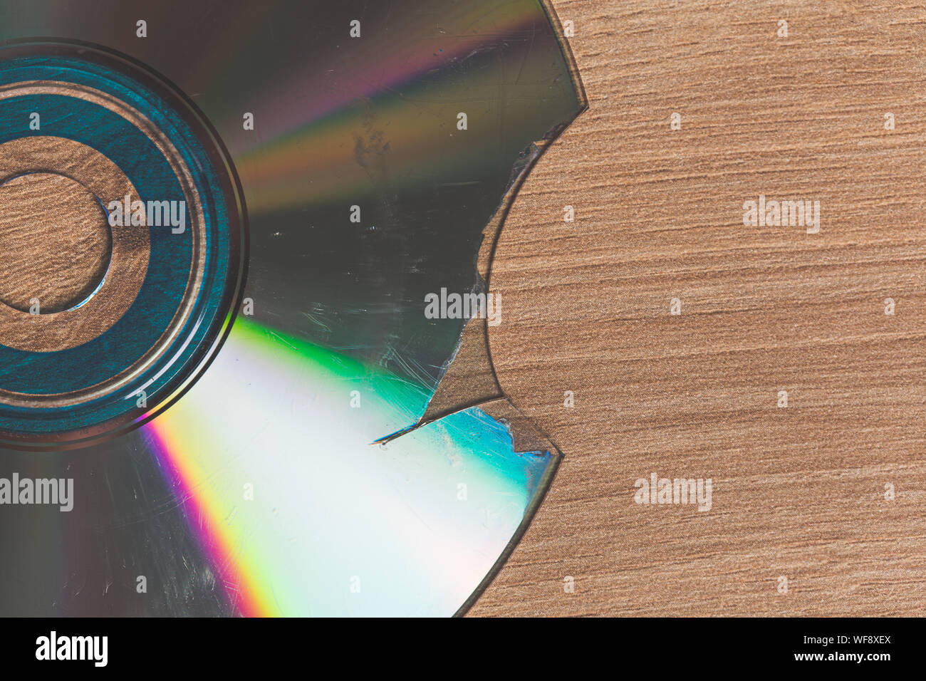 Broken and damaged optical disk storage data Stock Photo