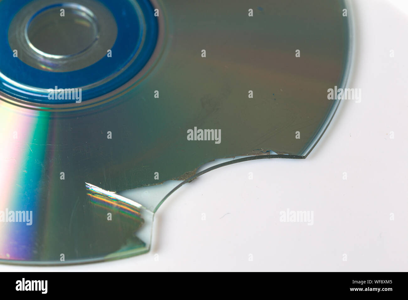 Broken and damaged optical disk storage data Stock Photo Alamy