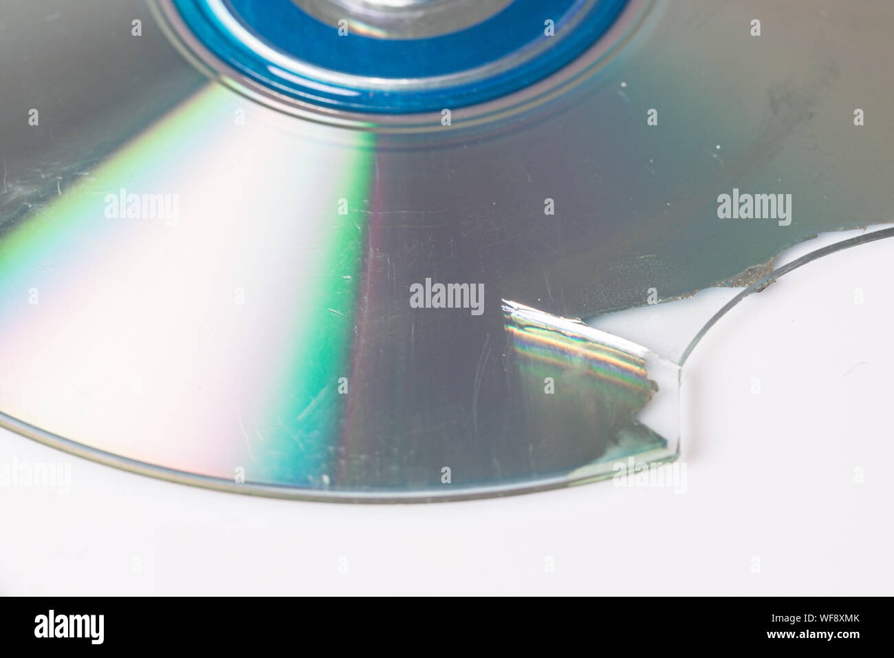 Broken and damaged optical disk storage data Stock Photo