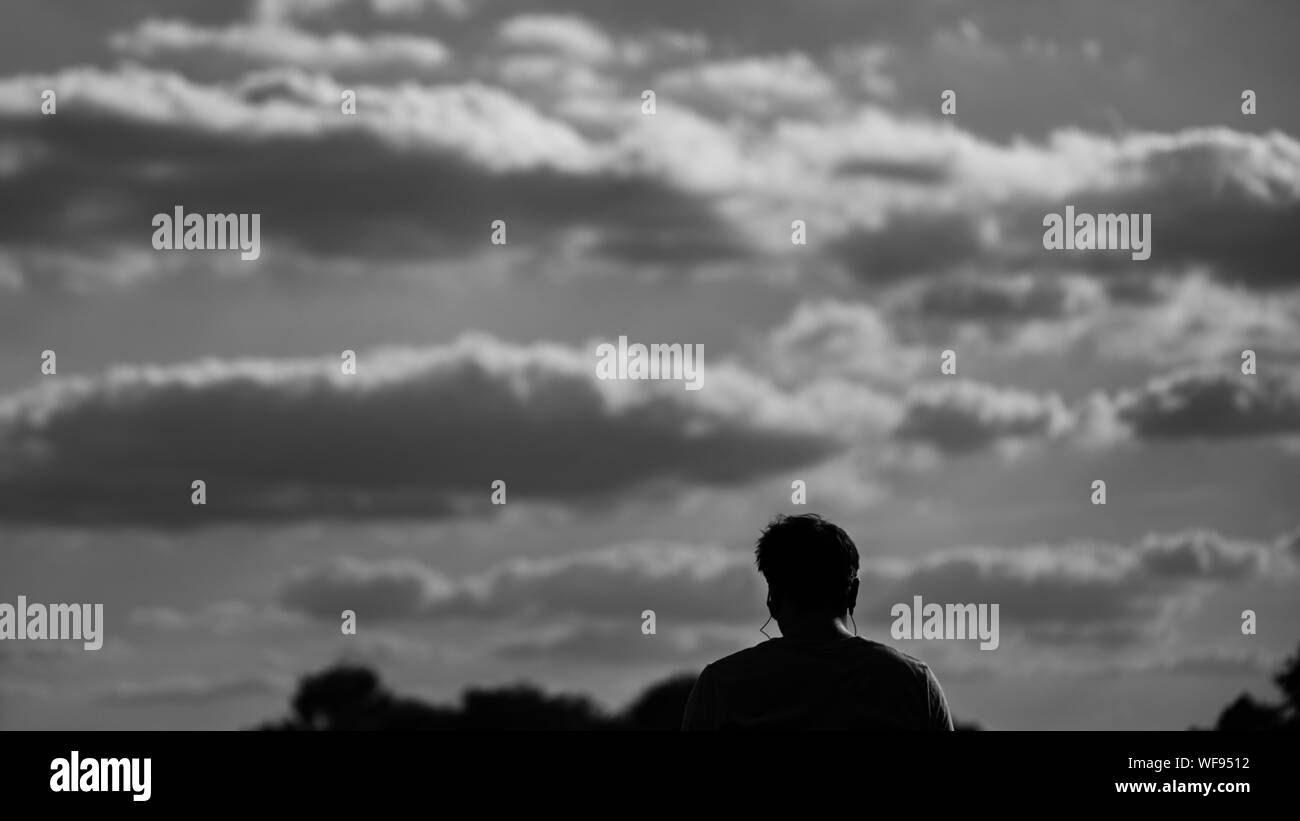 Rear view man silhouette Black and White Stock Photos & Images - Alamy