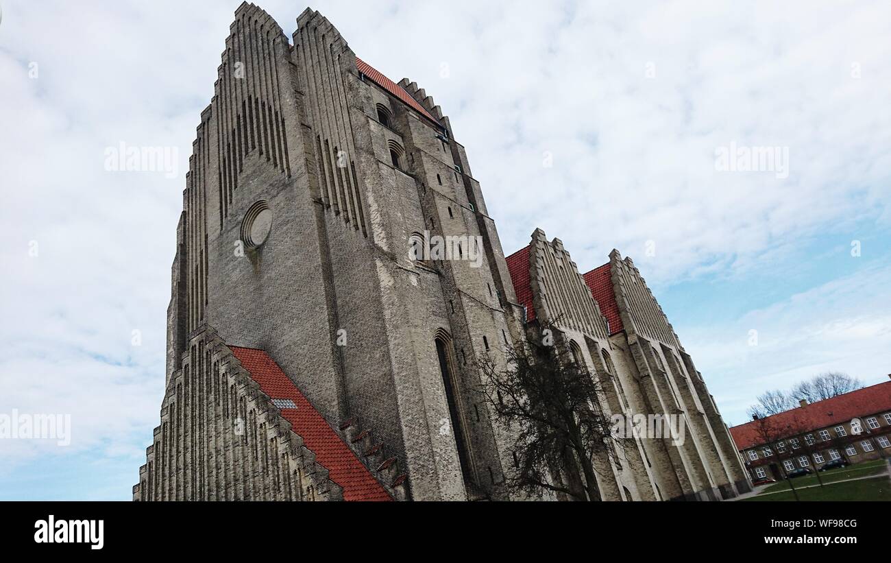 Low Angle View Of Grundtvig Church Against Sky Stock Photo