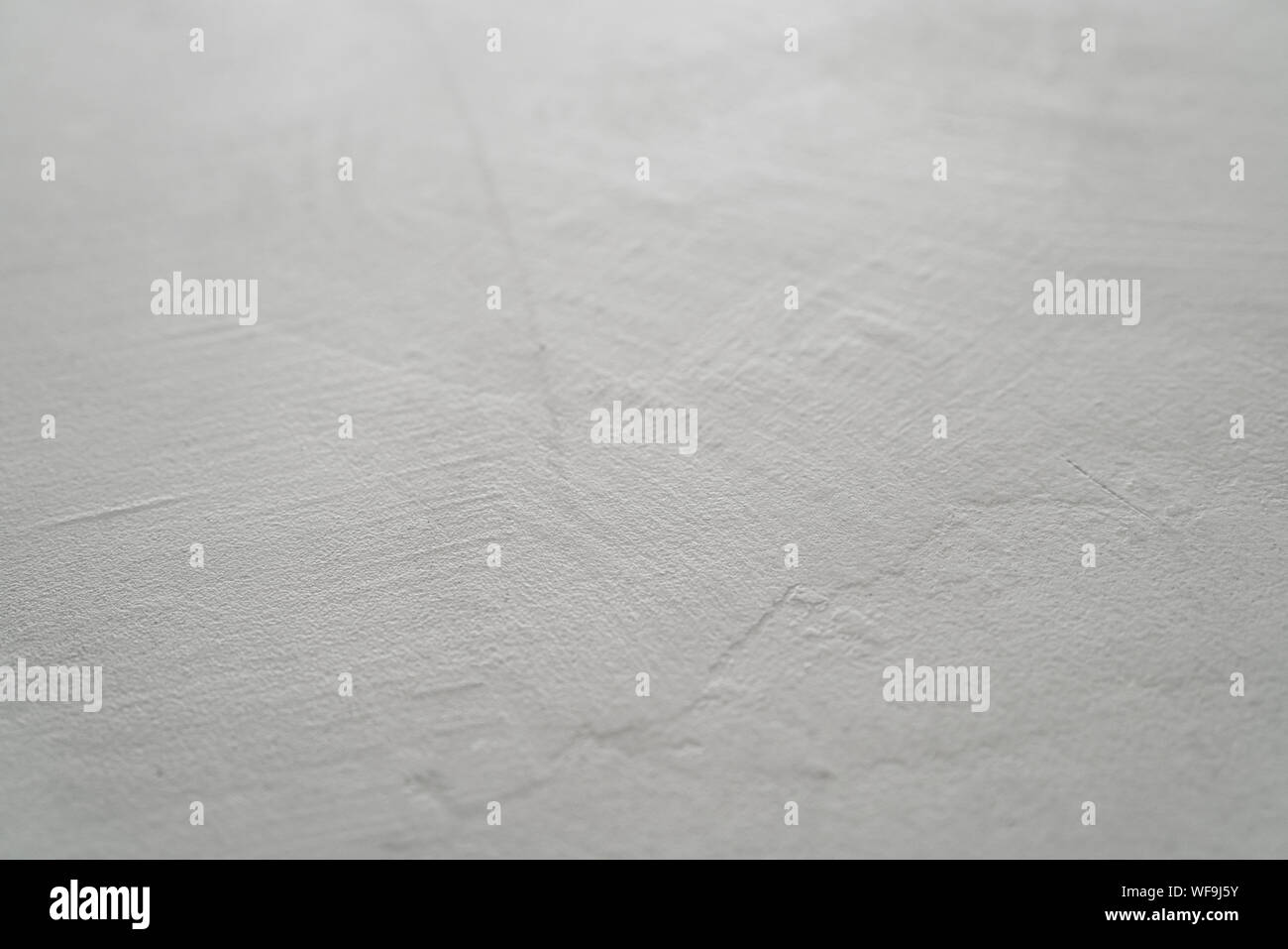 Closeup background of decorative plaster surface for product placement, good for backdrop Stock Photo