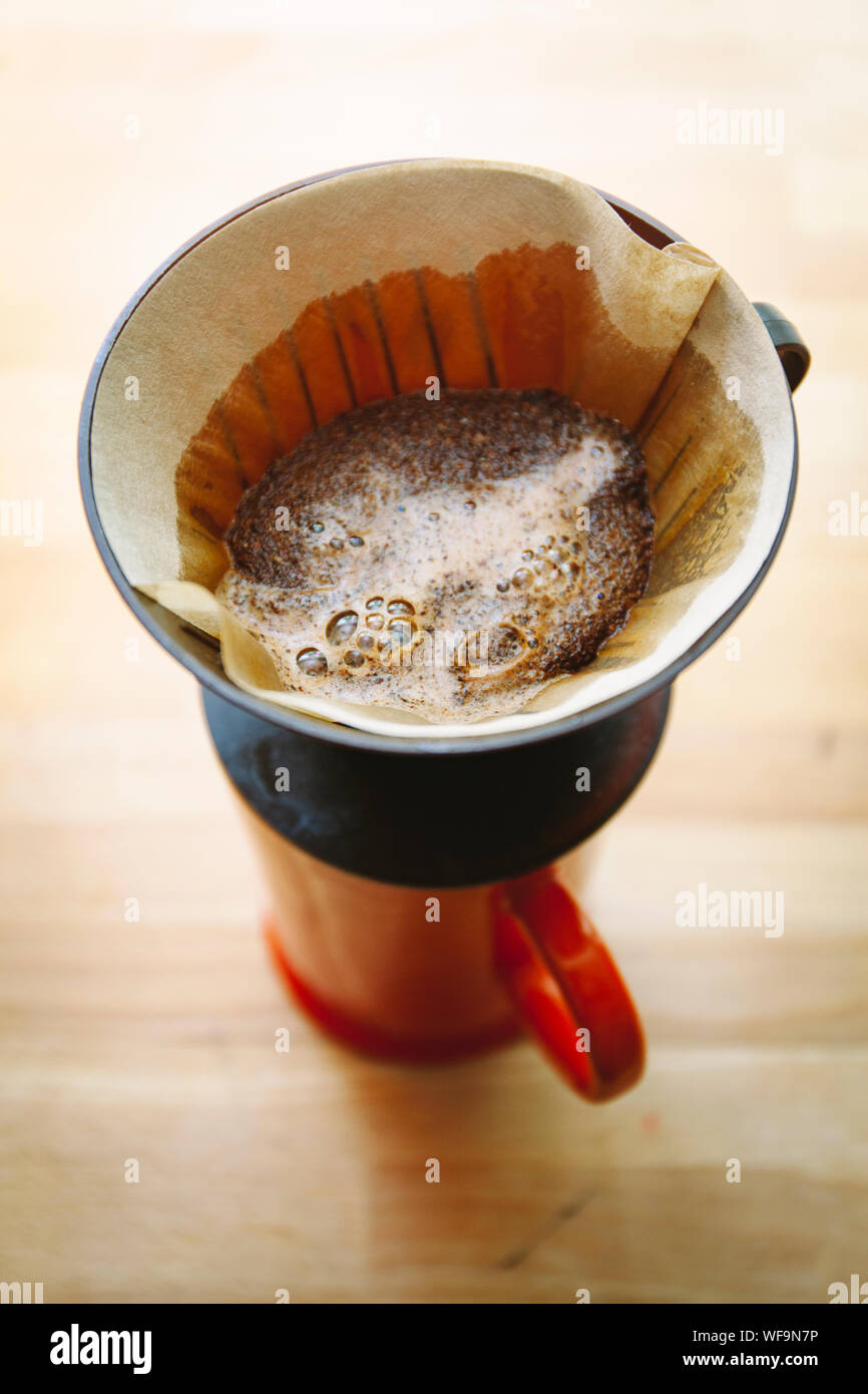 High Angle View Of Brewed Coffee In Filter Pot On Table Stock Photo
