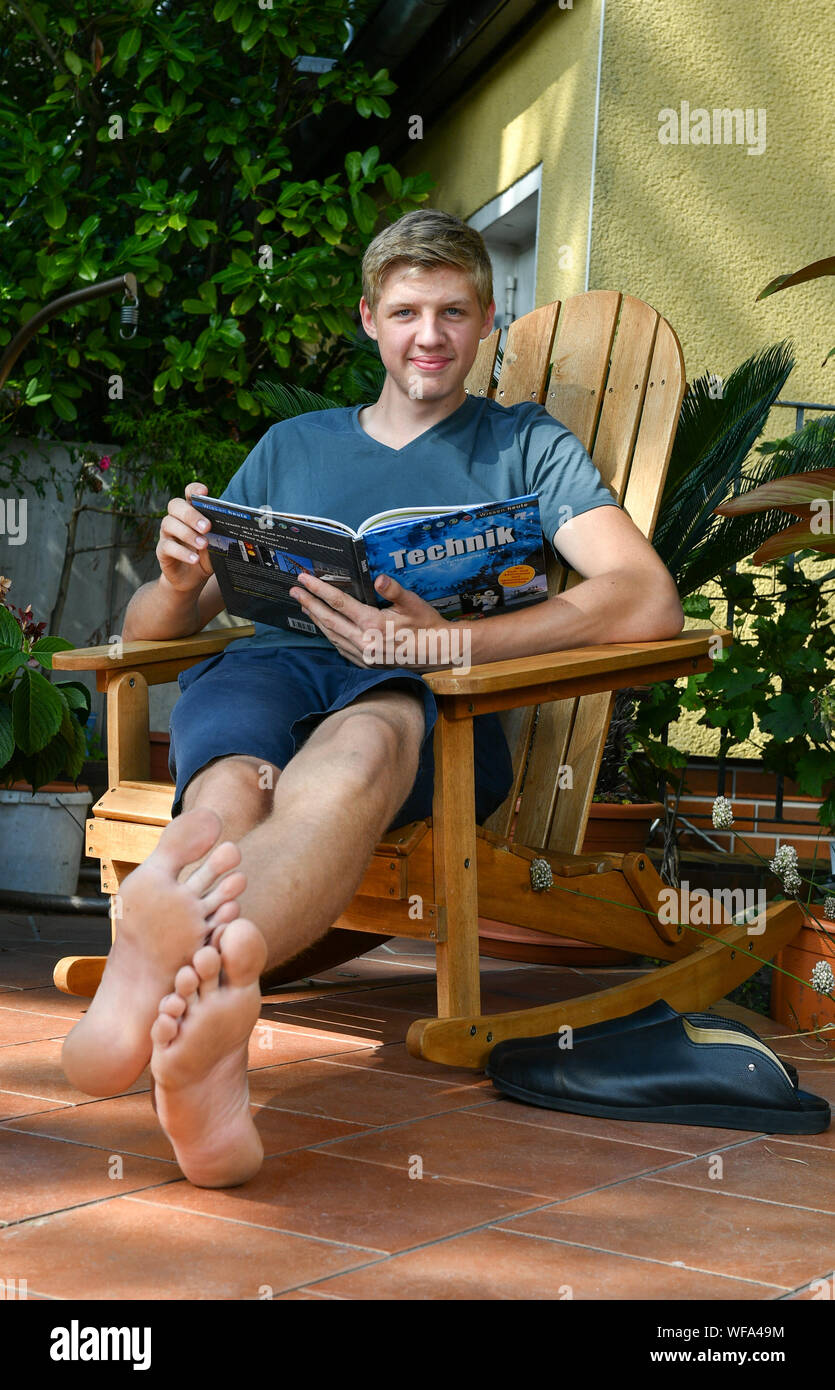 Berlin, Germany. 24th Aug, 2019. 16-year-old Lars Motza from Berlin is the teenager with the longest feet in the world. He can be found in the new Guinness Book of Records. His left foot measures 35.05 centimetres, his right 34.98 centimetres, which corresponds to shoe size 57. Credit: Jens Kalaene/dpa-Zentralbild/dpa/Alamy Live News Stock Photo