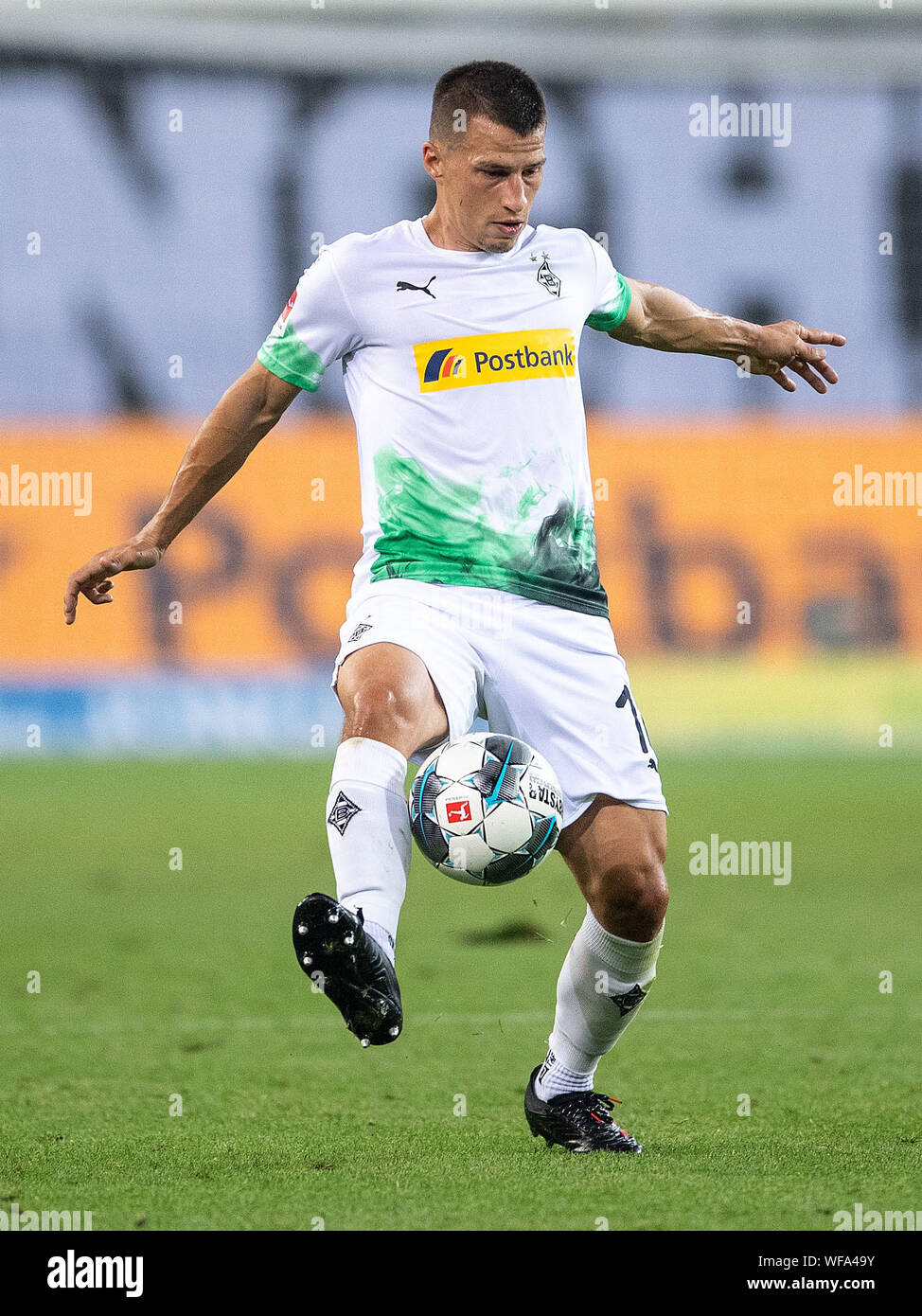 30 August 2019, North Rhine-Westphalia, Mönchengladbach: Soccer: Bundesliga, Borussia Mönchengladbach - RB Leipzig, Matchday 3. Gladbach's Stefan Lainer plays the ball. Photo: Marius Becker/dpa - IMPORTANT NOTE: In accordance with the requirements of the DFL Deutsche Fußball Liga or the DFB Deutscher Fußball-Bund, it is prohibited to use or have used photographs taken in the stadium and/or the match in the form of sequence images and/or video-like photo sequences. Stock Photo