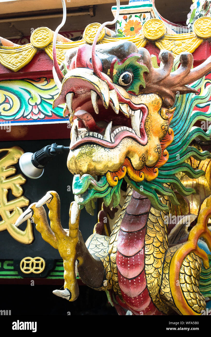 Colorful Dragon Sculpture Outside Temple Stock Photo