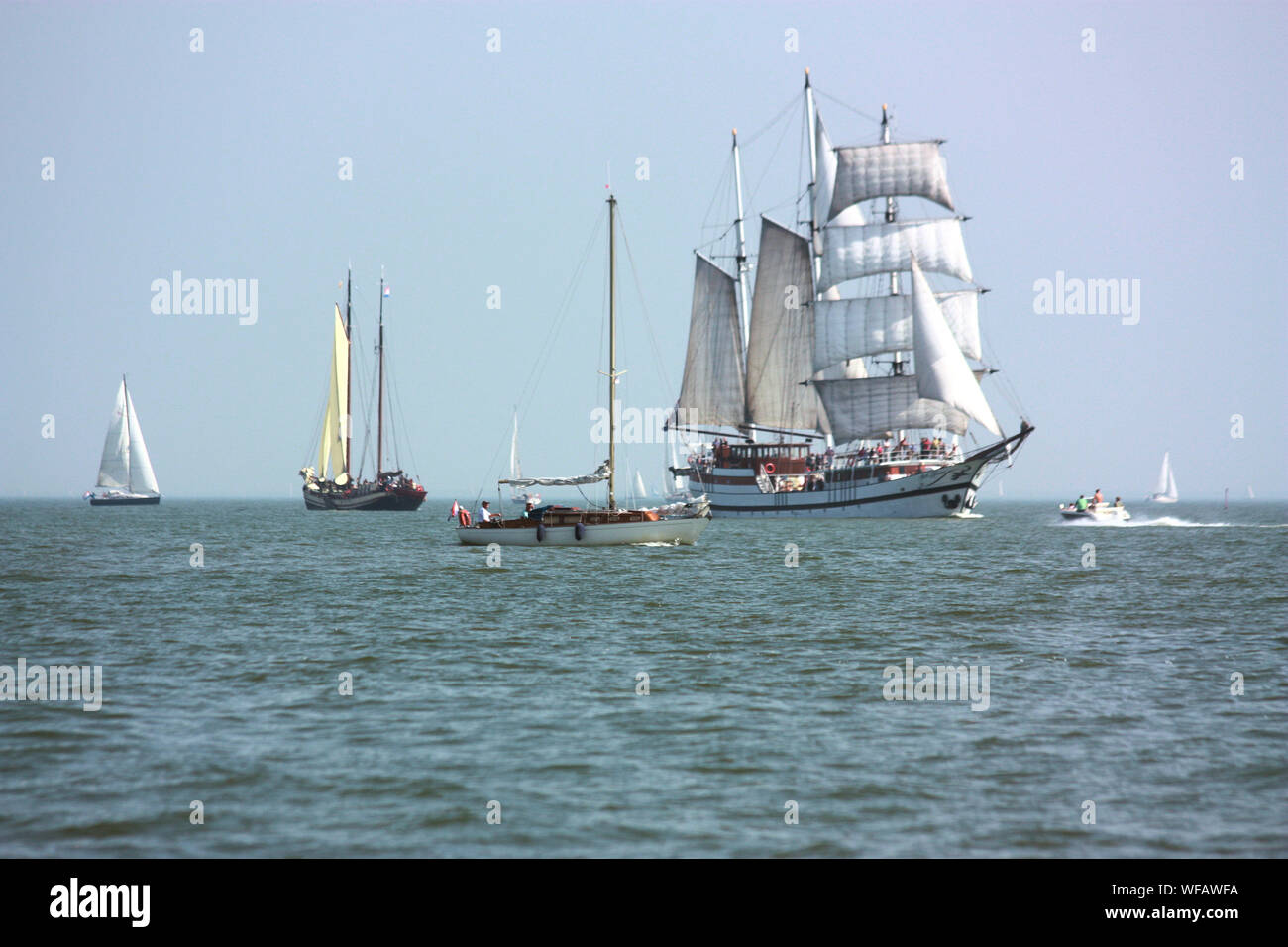 Beautiful View Of A Tall Ship Over The Volendam Sea In The Summer And Some Sailing Ships And Boats Around Stock Photo Alamy