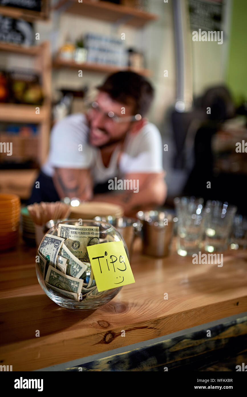 Coffee business concept - Tips jar Stock Photo
