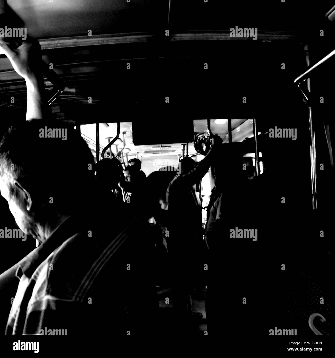 Bus passengers standing hires stock photography and images Alamy