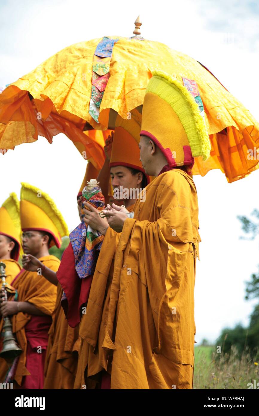 Tibetan ceremony with costumes and musical instruments Stock Photo
