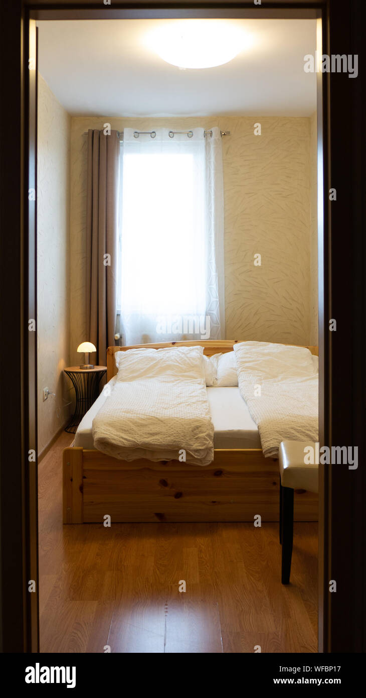 room interior with small lamp and chair Stock Photo - Alamy