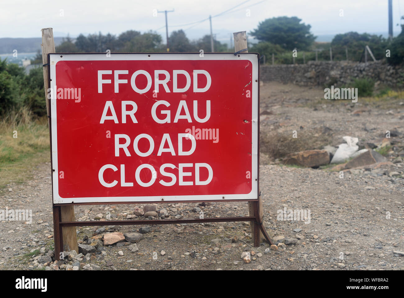 Welsh language Ffordd Ar Gau Road Closed sign. White on red background ...