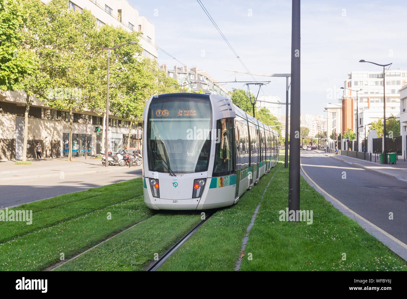 Paris tram - Grass covered tram track in the 15th arrondissement of Paris, France, Europe. Stock Photo