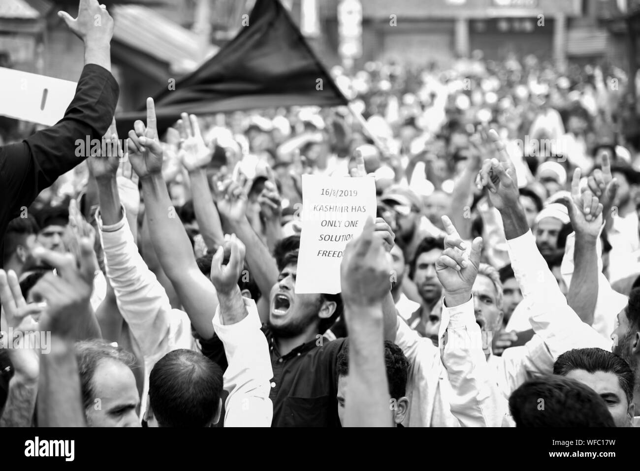 Srinagar, Jammu and Kashmir, India. 16th Aug, 2019. Kashmir protesters make gestures during the demonstration.Hundreds of people have held a street protest in Kashmir as India's government assured the Supreme Court that the situation in the disputed region is being reviewed daily and unprecedented security restrictions will be removed over the next few days. Credit: Idrees Abbas/SOPA Images/ZUMA Wire/Alamy Live News Stock Photo