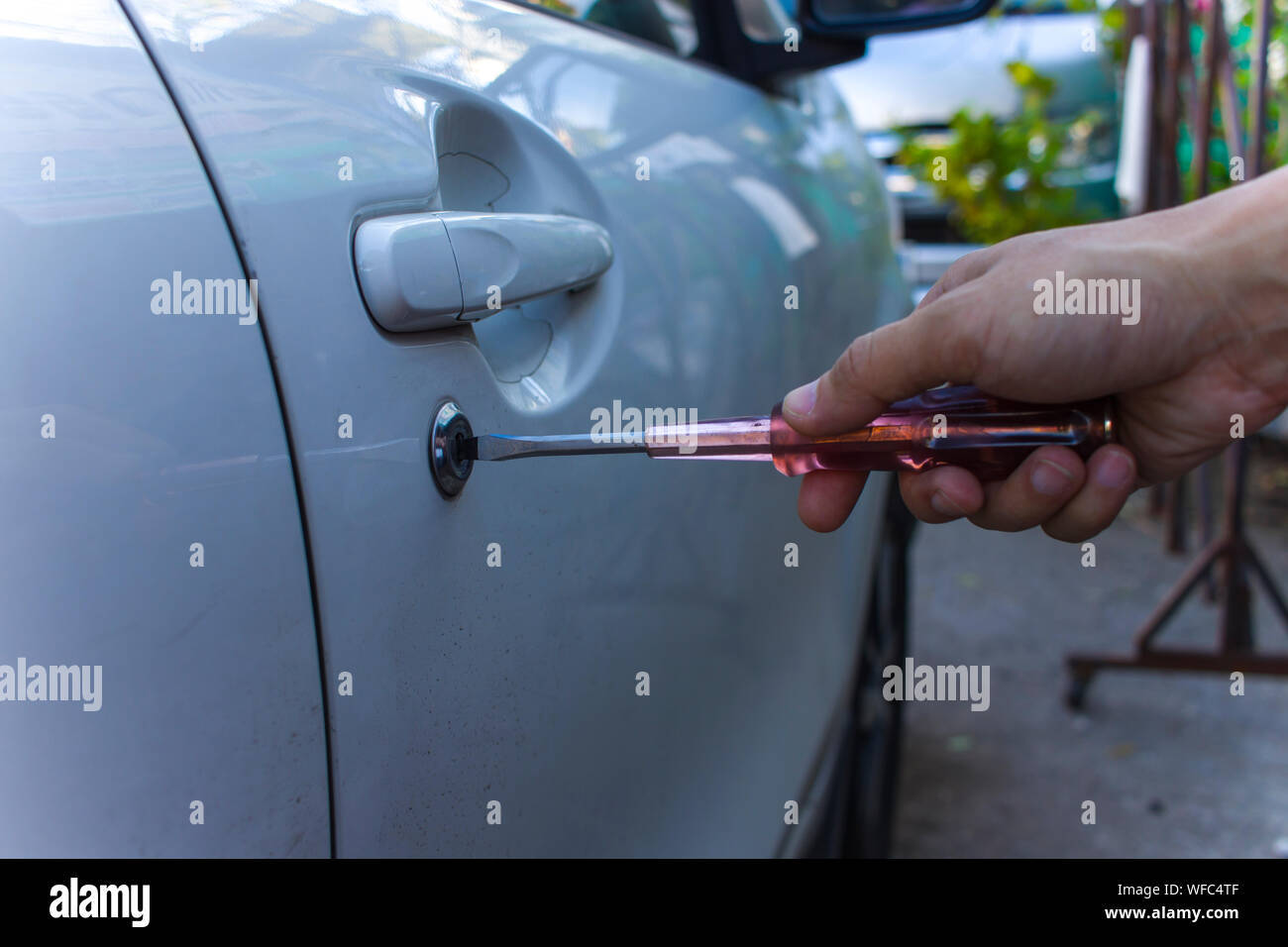 Selective Focus On Car Key Remote And Tools In Man S Hand Open The