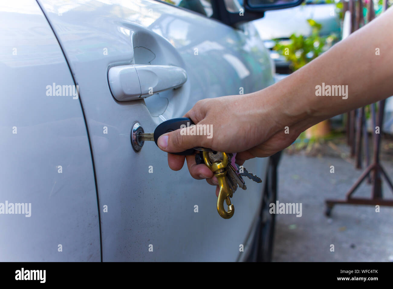 Selective Focus On Car Key Remote And Tools In Man S Hand Open The
