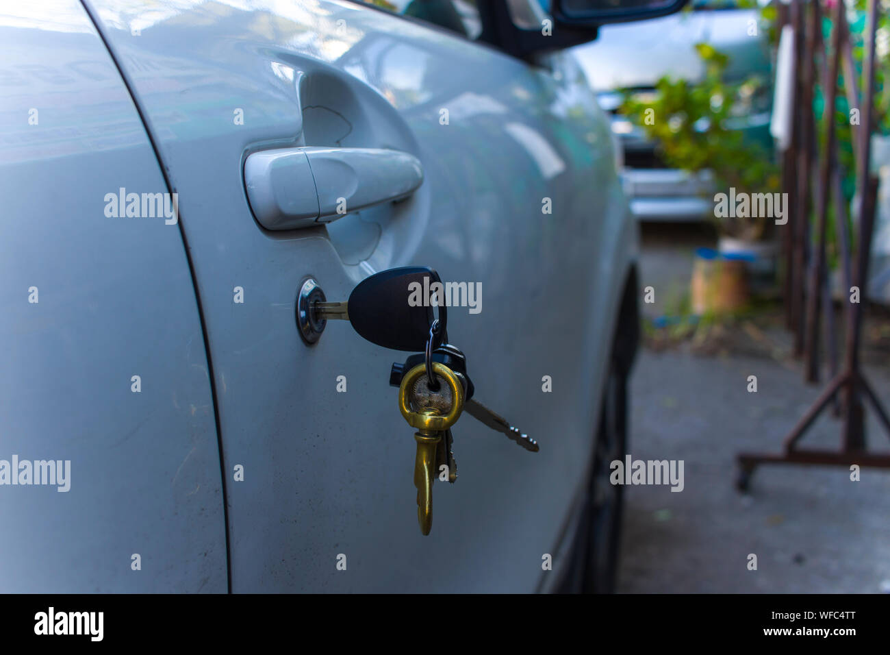Left key on the car door at parking lots High resolution image gallery