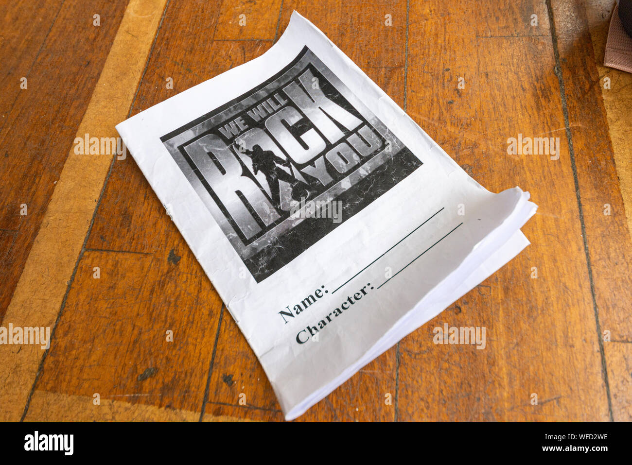 We Will Rock You musical adaptation score for schools lyric and lines booklet. Roughed up. Authentic situation, in use during rehearsals. Copyspace Stock Photo