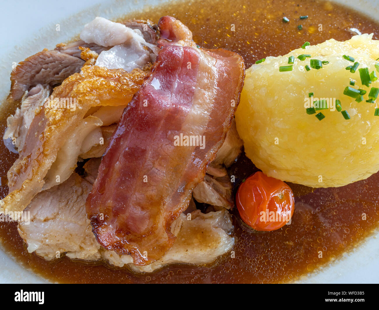 Bavarian roast pork with crackling and dumplings Stock Photo Alamy