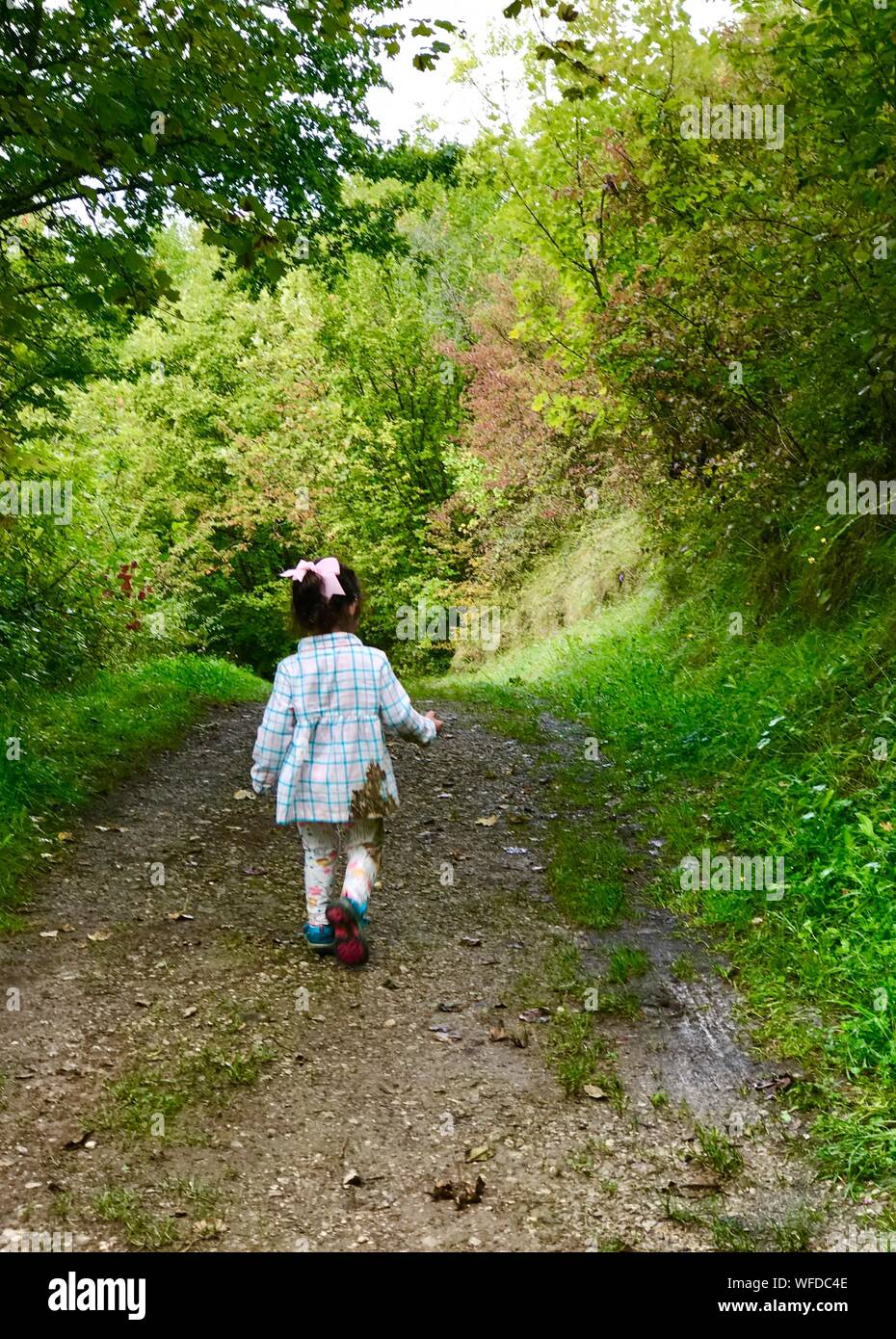 Girl Walking On Dirt Road High Resolution Stock Photography and Images ...